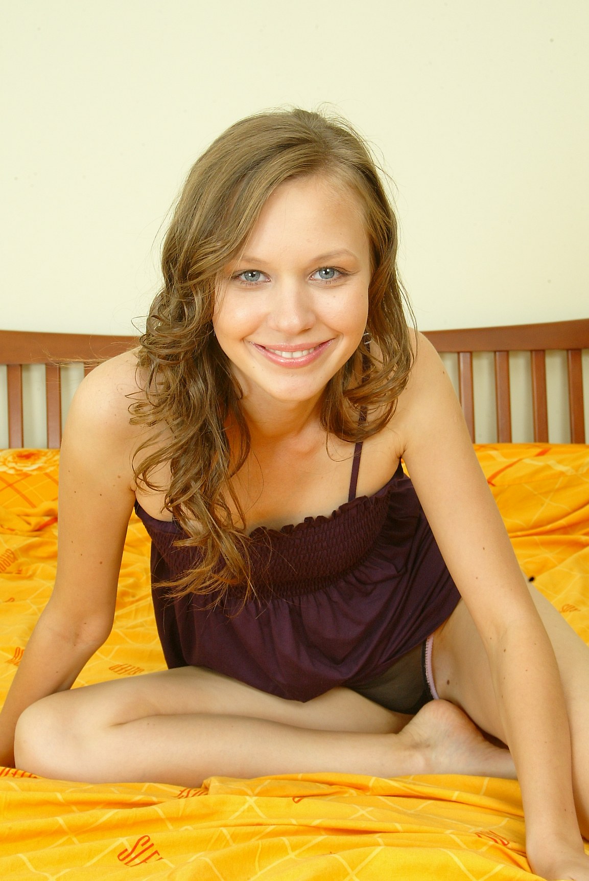 cute-ukrainian-teen-poses-on-her-bed-8