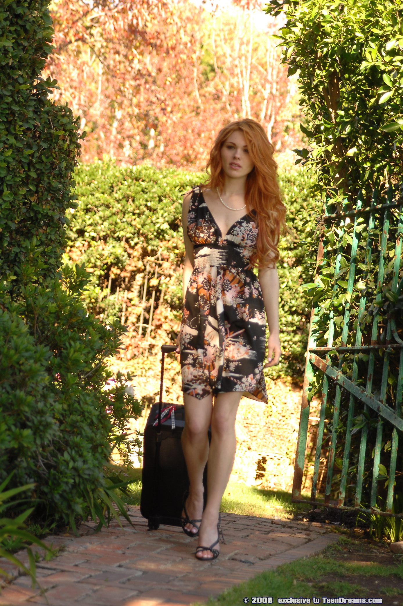 hot-redhead-getting-naked-on-her-balcony-1