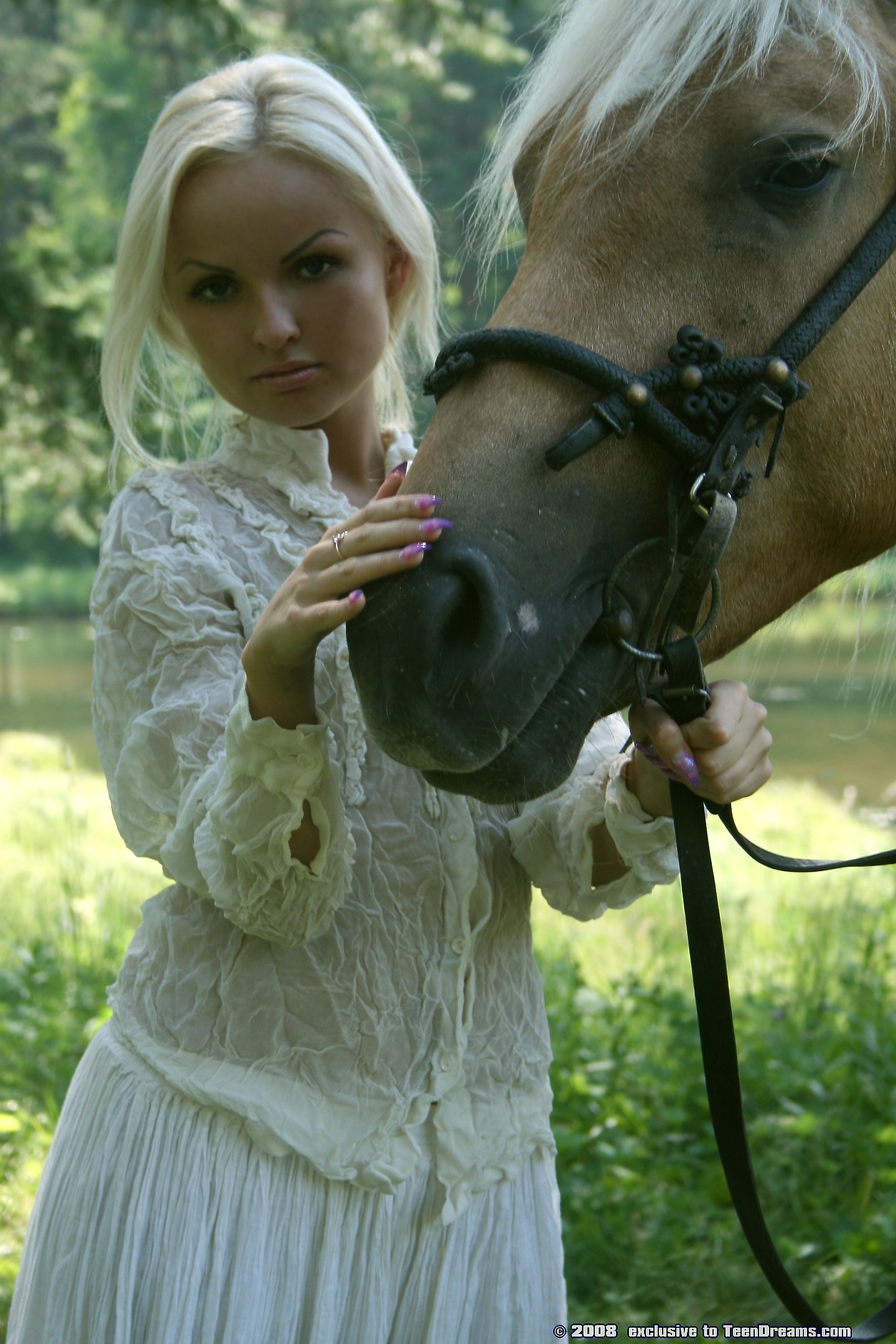 pretty-blonde-riding-horse-naked-in-woods-1