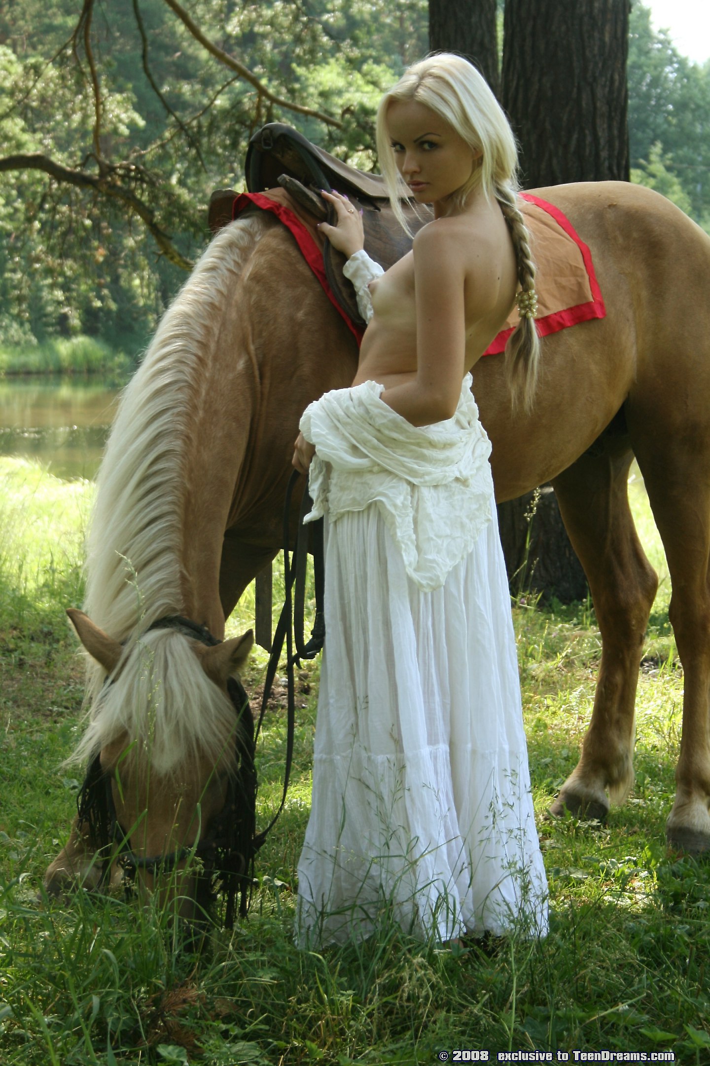 pretty-blonde-riding-horse-naked-in-woods-3