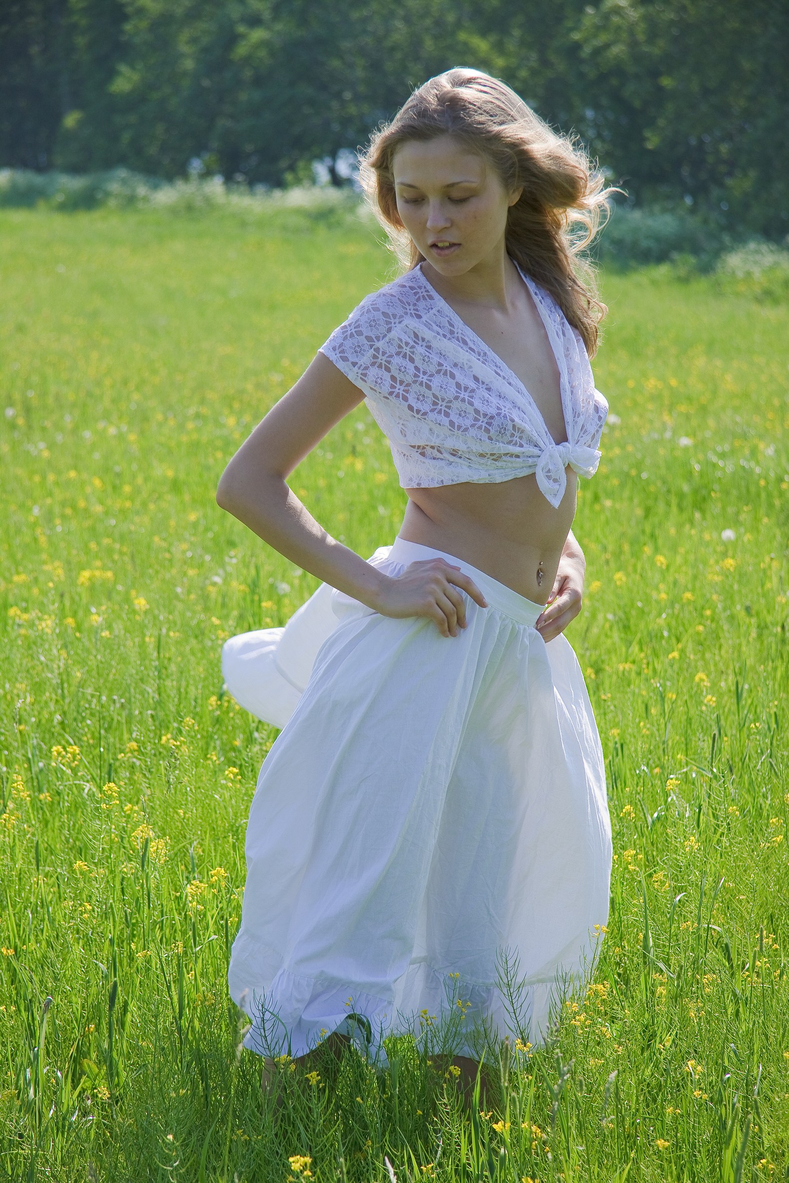 sweet-blonde-teen-masturbating-her-shaved-pussy-outdoors-2