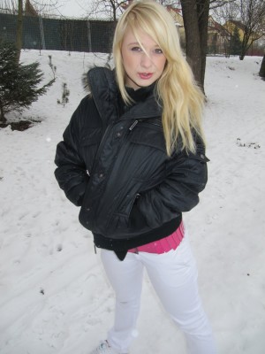 Pleasing golden-haired legal age teenager shows her cute mambos and pussy in the snow