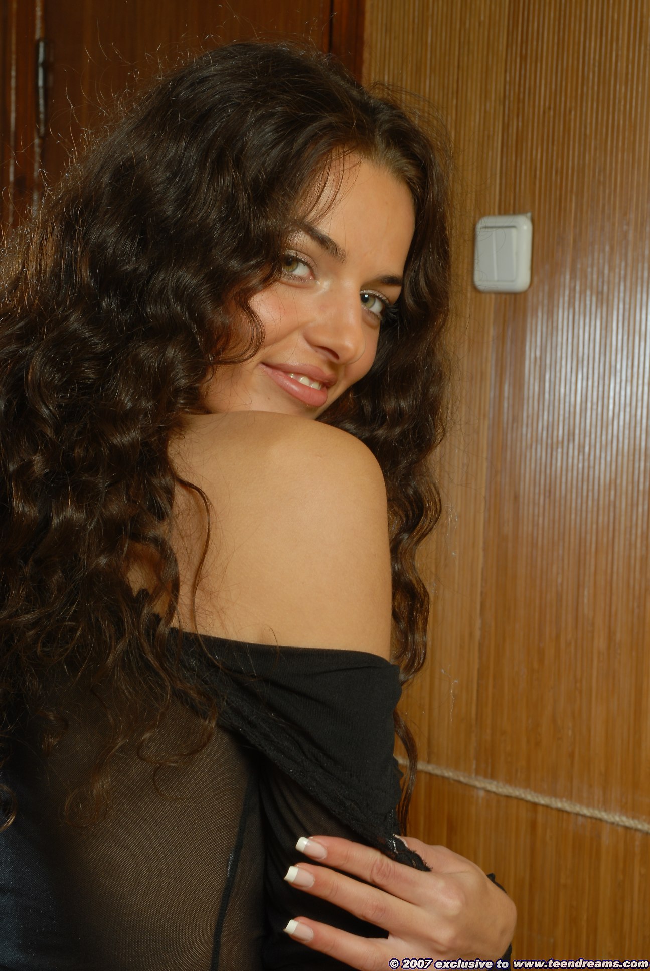 ukrainian-brunette-slowly-strips-12